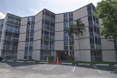 Charming 2-Bedroom Condo in Desirable Las Brisas at Country Club on Country Club of Miami in Florida - for sale on GolfHomes.com, golf home, golf lot