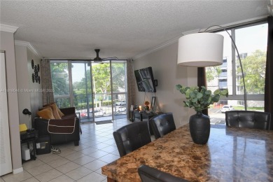 Charming 2-Bedroom Condo in Desirable Las Brisas at Country Club on Country Club of Miami in Florida - for sale on GolfHomes.com, golf home, golf lot