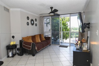 Charming 2-Bedroom Condo in Desirable Las Brisas at Country Club on Country Club of Miami in Florida - for sale on GolfHomes.com, golf home, golf lot