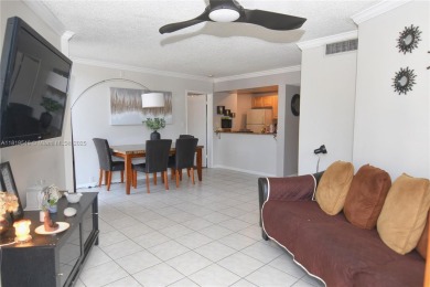 Charming 2-Bedroom Condo in Desirable Las Brisas at Country Club on Country Club of Miami in Florida - for sale on GolfHomes.com, golf home, golf lot