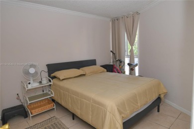 Charming 2-Bedroom Condo in Desirable Las Brisas at Country Club on Country Club of Miami in Florida - for sale on GolfHomes.com, golf home, golf lot