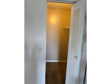 Charming 2-Bedroom Condo in Desirable Las Brisas at Country Club on Country Club of Miami in Florida - for sale on GolfHomes.com, golf home, golf lot