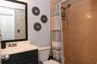 Charming 2-Bedroom Condo in Desirable Las Brisas at Country Club on Country Club of Miami in Florida - for sale on GolfHomes.com, golf home, golf lot