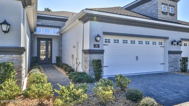 Don't miss this beautifully designed 3-bedroom, 3-bath townhome on Plantation Bay Golf and Country Club in Florida - for sale on GolfHomes.com, golf home, golf lot