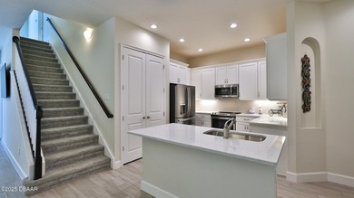 Don't miss this beautifully designed 3-bedroom, 3-bath townhome on Plantation Bay Golf and Country Club in Florida - for sale on GolfHomes.com, golf home, golf lot