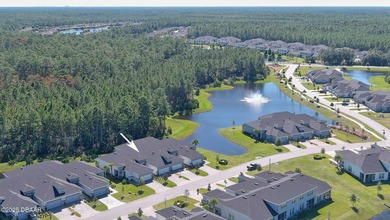 Don't miss this beautifully designed 3-bedroom, 3-bath townhome on Plantation Bay Golf and Country Club in Florida - for sale on GolfHomes.com, golf home, golf lot