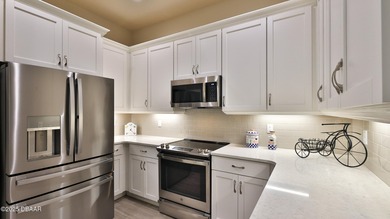 Don't miss this beautifully designed 3-bedroom, 3-bath townhome on Plantation Bay Golf and Country Club in Florida - for sale on GolfHomes.com, golf home, golf lot