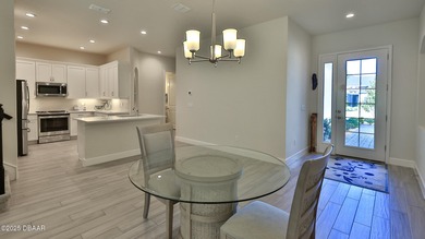 Don't miss this beautifully designed 3-bedroom, 3-bath townhome on Plantation Bay Golf and Country Club in Florida - for sale on GolfHomes.com, golf home, golf lot