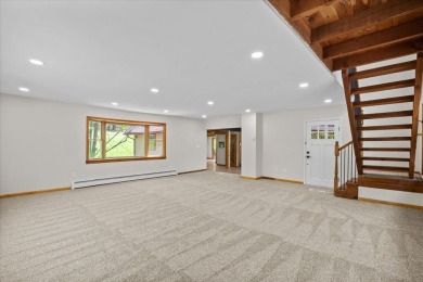 Situated on the golf course in Tanglwood Lakes, this stunning on Paupack Hills Golf and Country Club in Pennsylvania - for sale on GolfHomes.com, golf home, golf lot
