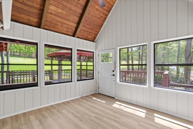 Situated on the golf course in Tanglwood Lakes, this stunning on Paupack Hills Golf and Country Club in Pennsylvania - for sale on GolfHomes.com, golf home, golf lot
