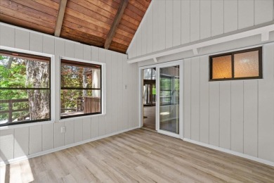 Situated on the golf course in Tanglwood Lakes, this stunning on Paupack Hills Golf and Country Club in Pennsylvania - for sale on GolfHomes.com, golf home, golf lot