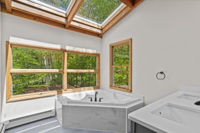 Situated on the golf course in Tanglwood Lakes, this stunning on Paupack Hills Golf and Country Club in Pennsylvania - for sale on GolfHomes.com, golf home, golf lot