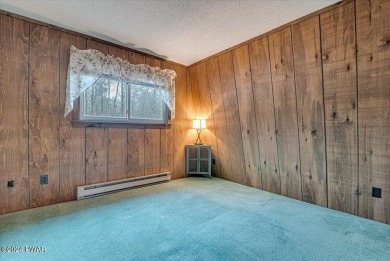 Nestled in the heart of The Hideout, this charming fully on The Hideout Golf in Pennsylvania - for sale on GolfHomes.com, golf home, golf lot