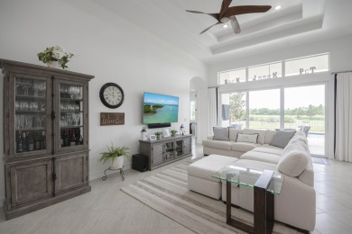 Live luxuriously & comfortably in this single-level Beaumont on Jupiter Country Club in Florida - for sale on GolfHomes.com, golf home, golf lot