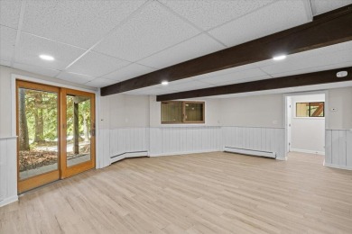 Situated on the golf course in Tanglwood Lakes, this stunning on Paupack Hills Golf and Country Club in Pennsylvania - for sale on GolfHomes.com, golf home, golf lot