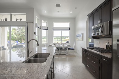 Live luxuriously & comfortably in this single-level Beaumont on Jupiter Country Club in Florida - for sale on GolfHomes.com, golf home, golf lot