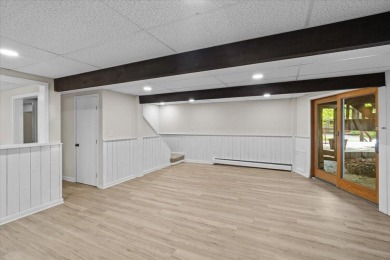 Situated on the golf course in Tanglwood Lakes, this stunning on Paupack Hills Golf and Country Club in Pennsylvania - for sale on GolfHomes.com, golf home, golf lot