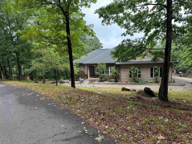 Your perfect second home awaits in Hot Springs Village! This on Cortez Golf Course in Arkansas - for sale on GolfHomes.com, golf home, golf lot