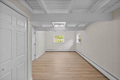 Situated on the golf course in Tanglwood Lakes, this stunning on Paupack Hills Golf and Country Club in Pennsylvania - for sale on GolfHomes.com, golf home, golf lot