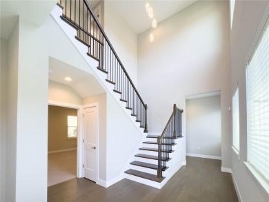 This 2021 home is available today for sale in the Famous Bella on Bella Collina Golf Club in Florida - for sale on GolfHomes.com, golf home, golf lot