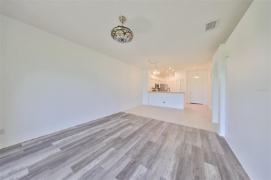 One or more photo(s) has been virtually staged. PEACEFUL AND on Falcon Watch Golf Club in Florida - for sale on GolfHomes.com, golf home, golf lot