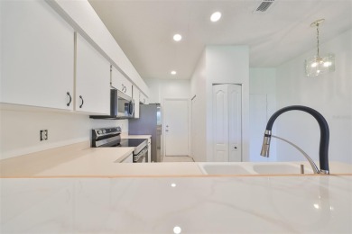 One or more photo(s) has been virtually staged. PEACEFUL AND on Falcon Watch Golf Club in Florida - for sale on GolfHomes.com, golf home, golf lot