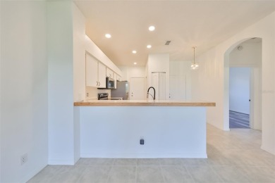 One or more photo(s) has been virtually staged. PEACEFUL AND on Falcon Watch Golf Club in Florida - for sale on GolfHomes.com, golf home, golf lot