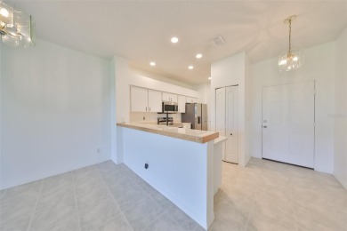 One or more photo(s) has been virtually staged. PEACEFUL AND on Falcon Watch Golf Club in Florida - for sale on GolfHomes.com, golf home, golf lot
