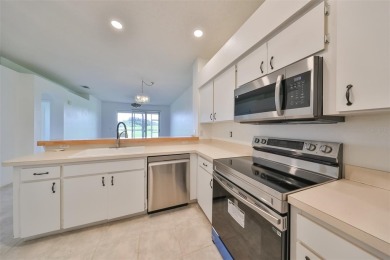 One or more photo(s) has been virtually staged. PEACEFUL AND on Falcon Watch Golf Club in Florida - for sale on GolfHomes.com, golf home, golf lot