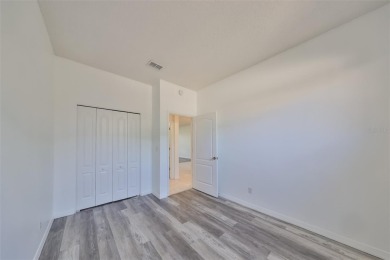 One or more photo(s) has been virtually staged. PEACEFUL AND on Falcon Watch Golf Club in Florida - for sale on GolfHomes.com, golf home, golf lot