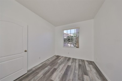 One or more photo(s) has been virtually staged. PEACEFUL AND on Falcon Watch Golf Club in Florida - for sale on GolfHomes.com, golf home, golf lot