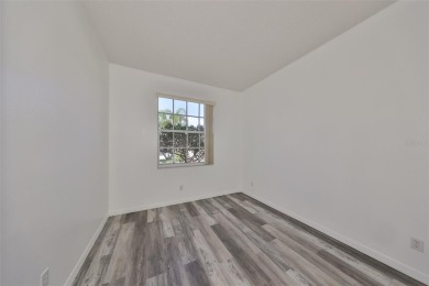 One or more photo(s) has been virtually staged. PEACEFUL AND on Falcon Watch Golf Club in Florida - for sale on GolfHomes.com, golf home, golf lot