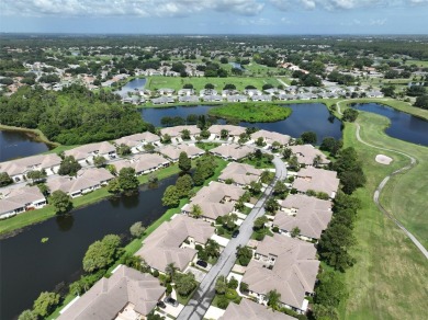One or more photo(s) has been virtually staged. PEACEFUL AND on Falcon Watch Golf Club in Florida - for sale on GolfHomes.com, golf home, golf lot