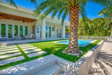 180 13th St, Key Colony Beach. Luxury waterfront living meets on Key Colony Beach Golf Course in Florida - for sale on GolfHomes.com, golf home, golf lot