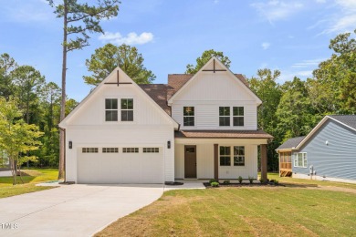 Gorgeous New Build With First Floor Owner's Suite  Office in the on River Golf and Country Club at Lake Royale in North Carolina - for sale on GolfHomes.com, golf home, golf lot