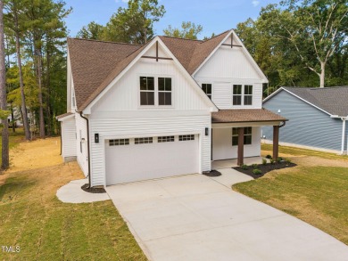 Gorgeous New Build With First Floor Owner's Suite  Office in the on River Golf and Country Club at Lake Royale in North Carolina - for sale on GolfHomes.com, golf home, golf lot