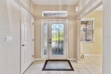 Beautiful and immaculately maintained Savoy model featuring a on Poinciana Golf Club in Florida - for sale on GolfHomes.com, golf home, golf lot