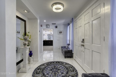 This extraordinary, designer-renovated 4-bedroom, 3-bath on Sugar Mill Country Club in Florida - for sale on GolfHomes.com, golf home, golf lot