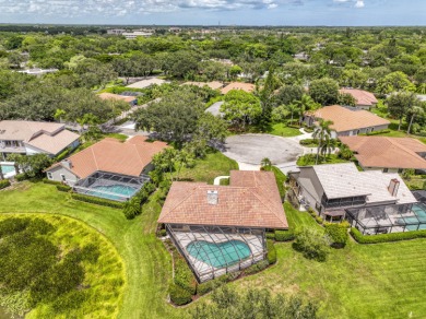 Discover sweeping golf course and lake views at this serene on Old Marsh Golf Club in Florida - for sale on GolfHomes.com, golf home, golf lot