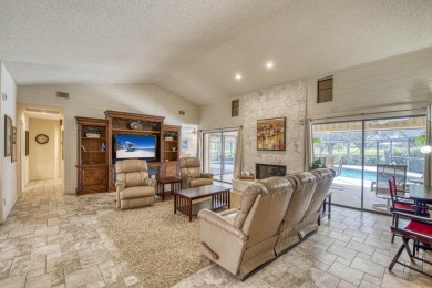 Discover sweeping golf course and lake views at this serene on Old Marsh Golf Club in Florida - for sale on GolfHomes.com, golf home, golf lot
