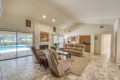 Discover sweeping golf course and lake views at this serene on Old Marsh Golf Club in Florida - for sale on GolfHomes.com, golf home, golf lot