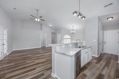 This beautifully updated single-level brick-front home is on Heron Point Golf Club in South Carolina - for sale on GolfHomes.com, golf home, golf lot
