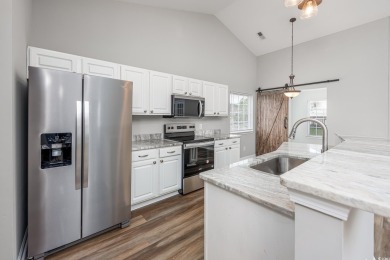 This beautifully updated single-level brick-front home is on Heron Point Golf Club in South Carolina - for sale on GolfHomes.com, golf home, golf lot