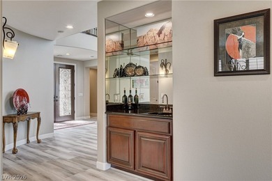 ELEVATED LIVING IN THIS PRESTIGIOUS GUARD GATED RED ROCK COUNTRY on Red Rock Country Club in Nevada - for sale on GolfHomes.com, golf home, golf lot