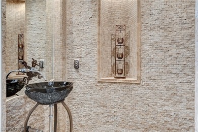 ELEVATED LIVING IN THIS PRESTIGIOUS GUARD GATED RED ROCK COUNTRY on Red Rock Country Club in Nevada - for sale on GolfHomes.com, golf home, golf lot