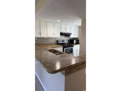If you are seeking a single level condominium over looking the on The Eagle Pointe Golf Resort in Indiana - for sale on GolfHomes.com, golf home, golf lot