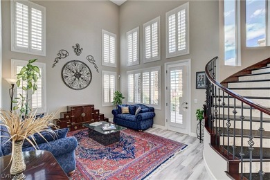 ELEVATED LIVING IN THIS PRESTIGIOUS GUARD GATED RED ROCK COUNTRY on Red Rock Country Club in Nevada - for sale on GolfHomes.com, golf home, golf lot