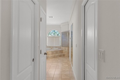 Beautiful Pine Ridge home tucked away on a quiet cul-de-sac on Pine Ridge Community Golf and Country Club in Florida - for sale on GolfHomes.com, golf home, golf lot