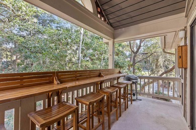 Enjoy relaxed coastal living in this 2 BR 2 BA upper-level end on The Seabrook Island Club in South Carolina - for sale on GolfHomes.com, golf home, golf lot