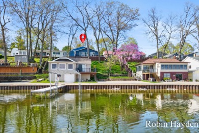 Lakefront  Golf Course Living on Morrison Lake! Welcome to this on Morrison Lake Country Club in Michigan - for sale on GolfHomes.com, golf home, golf lot